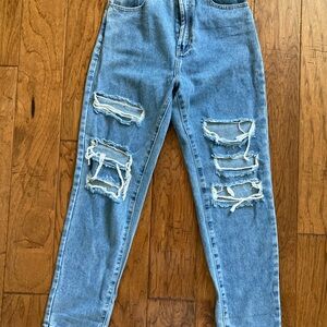 Women's Distressed Blue Jeans